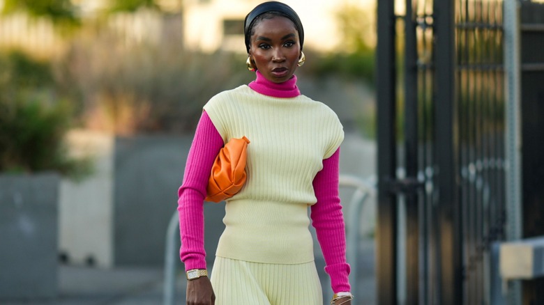 woman wearing turtleneck under dress