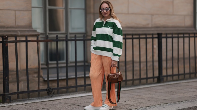 woman wearing tangerine pants