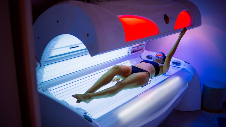 Woman in tanning bed