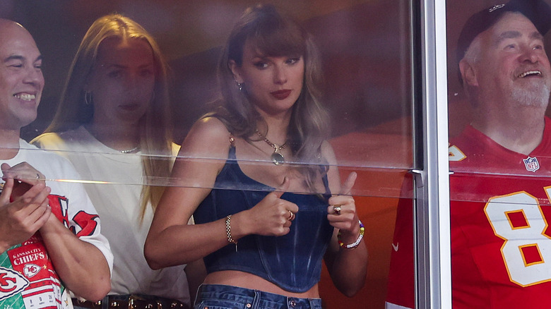 Taylor Swift wearing a denim corset top