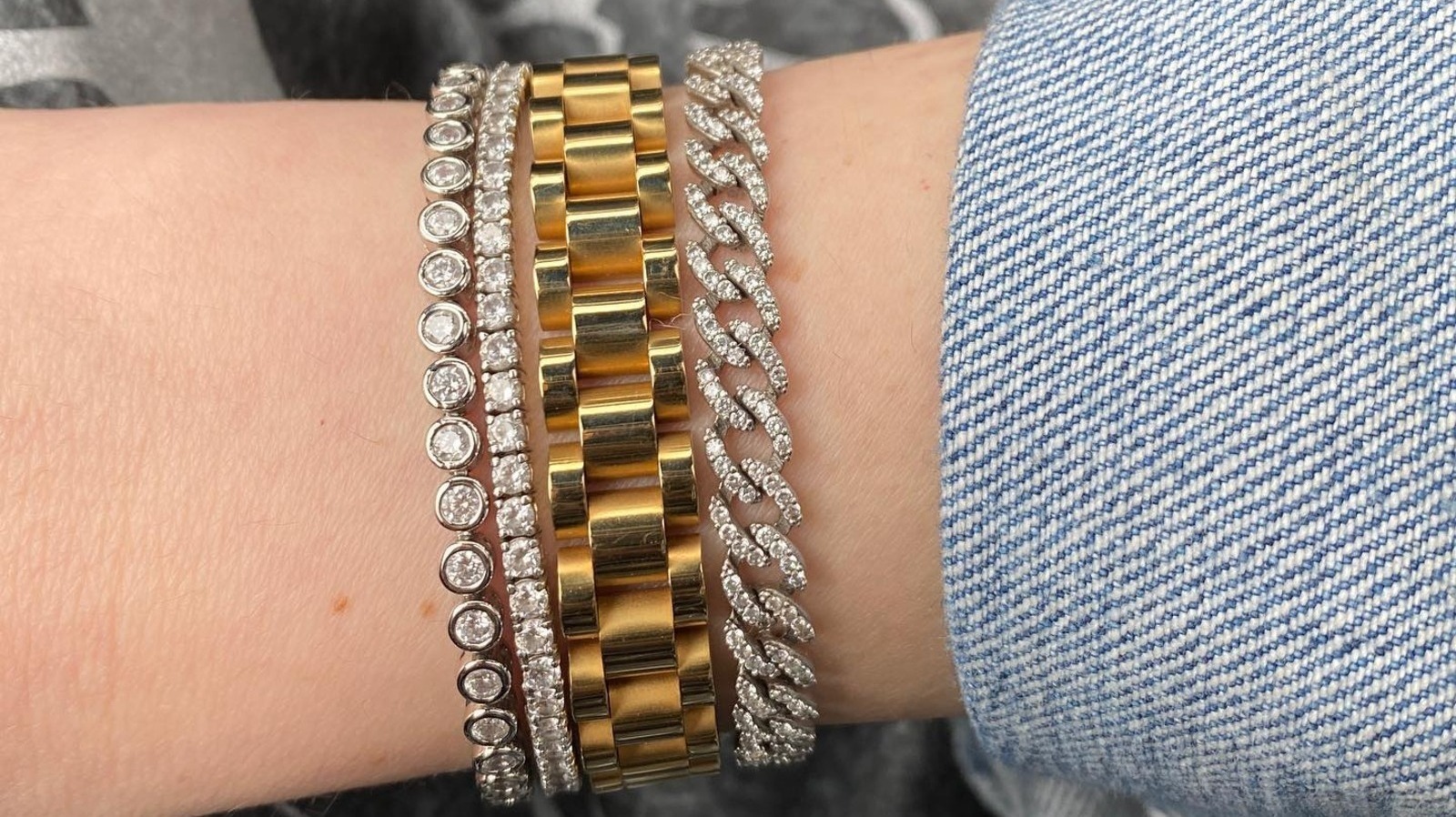 https://www.glam.com/img/gallery/tennis-bracelets-are-the-retro-statement-jewelry-trend-making-a-comeback/l-intro-1684343858.jpg
