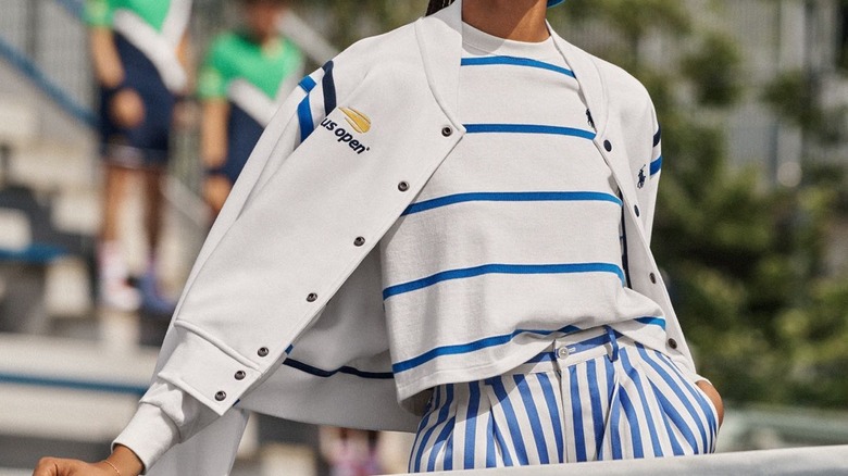 woman wearing US Open jacket