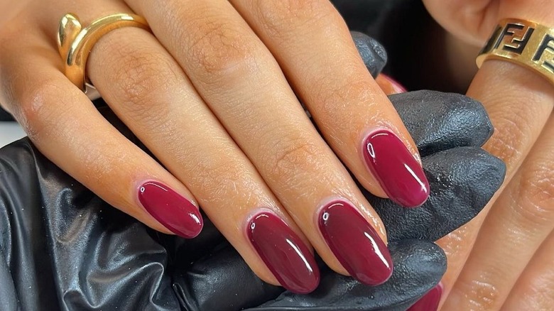 Long rounded purple-red nails