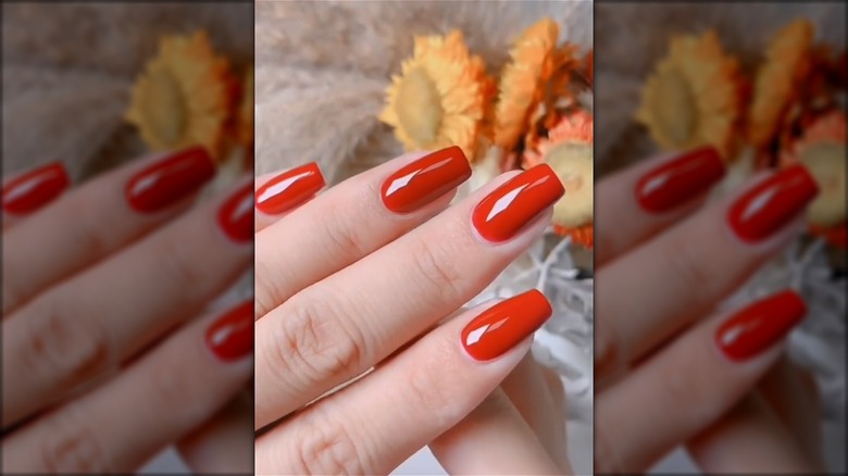 Red-orange square cut nails