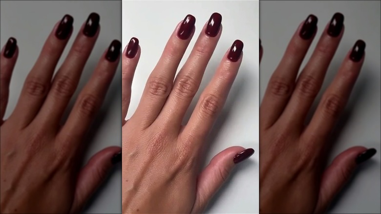 Rounded square-cut oxblood manicure