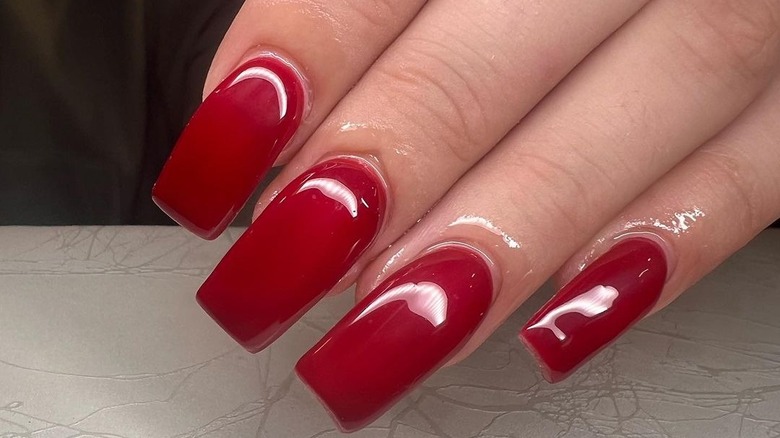 Square cut deep red nails