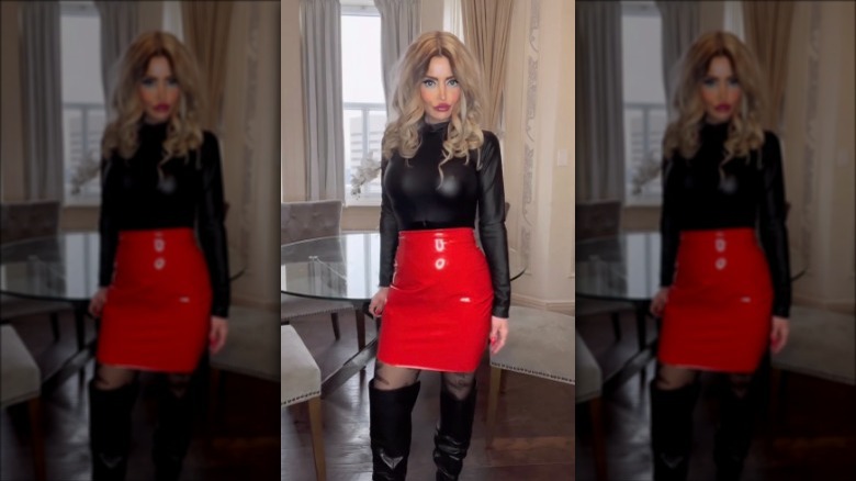 woman wearing red latex skirt