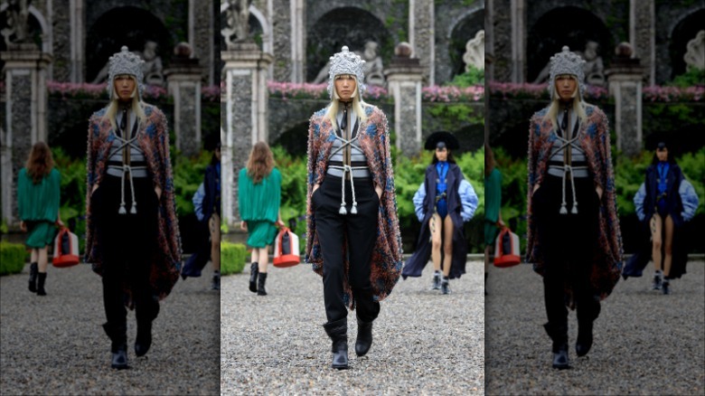 Model walking at Louis Vuitton show