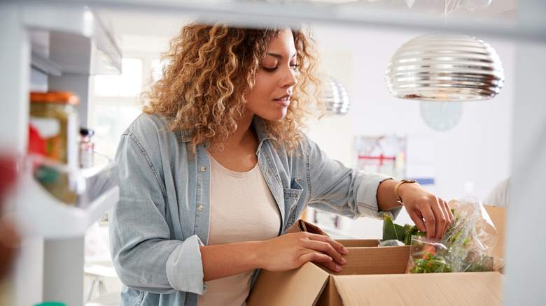 Woman shopping for vegetables