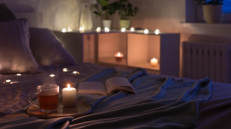 Cozy bedroom scene with candles