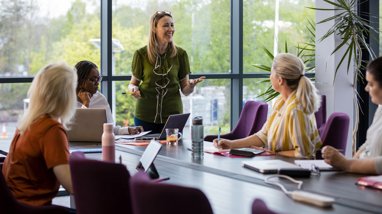 Woman speaking in conference room