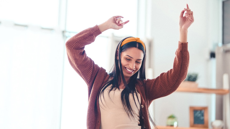 Outgoing woman dancing