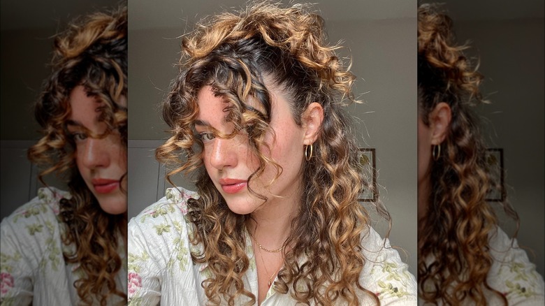 woman with curly bangs haircut