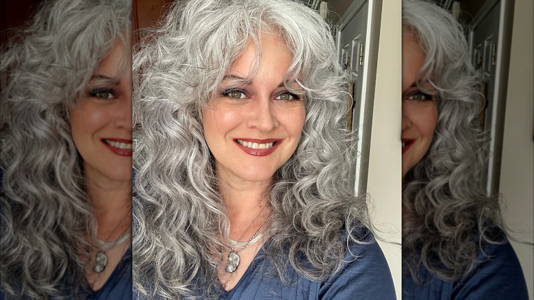 woman with grey curly bangs