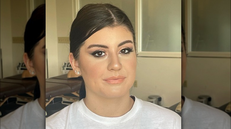 Woman wears full coverage foundation