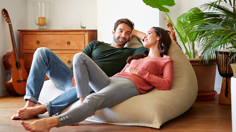 couple lying on beanbag