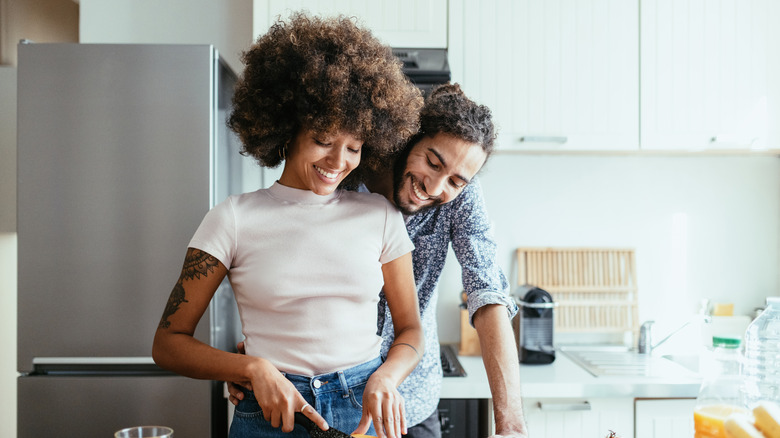 couple cooking at home