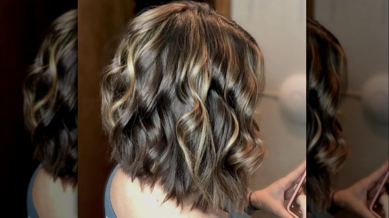 Women with subtly highlighted stacked bob