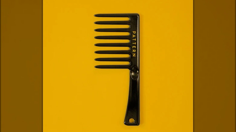 Black wide tooth comb