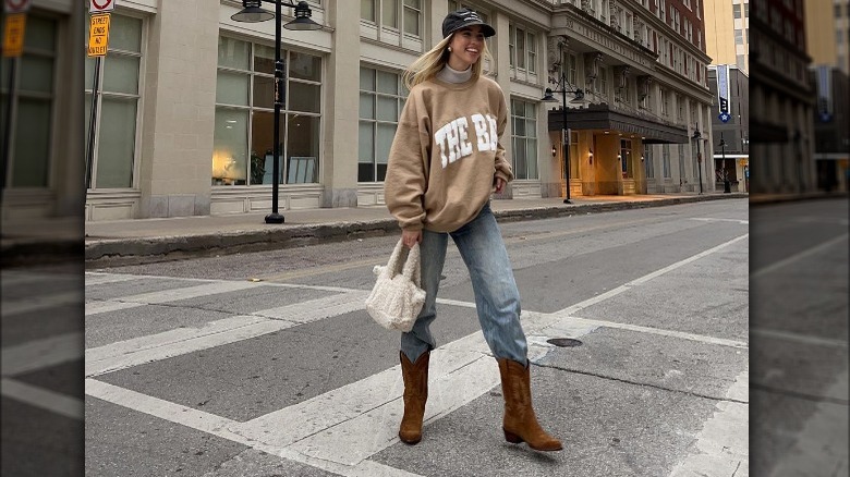 mom jeans and cowboy boots