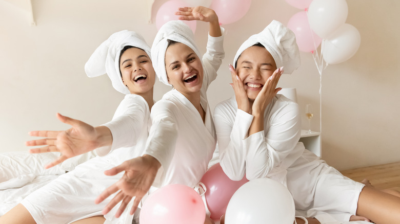 women with spa robes on