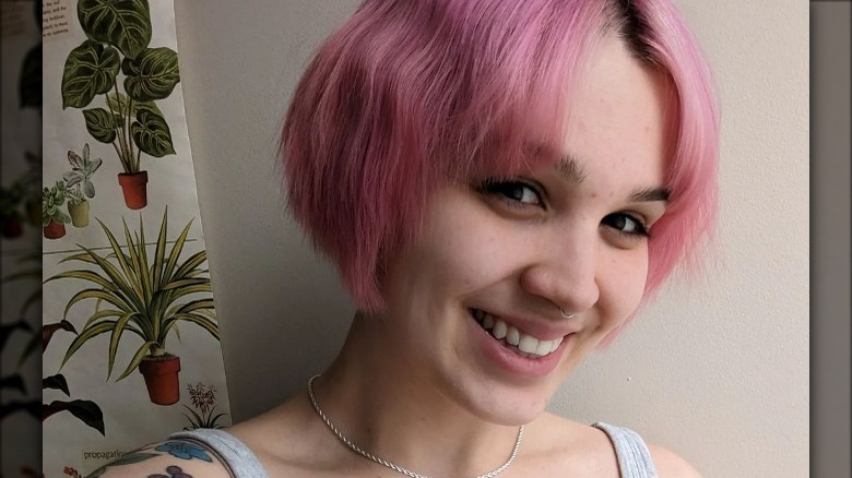 Woman with pink bob