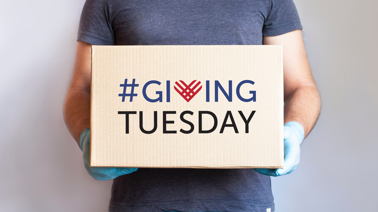 Person holding GivingTuesday box