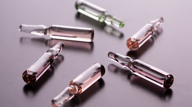 Several ampoules lay flat
