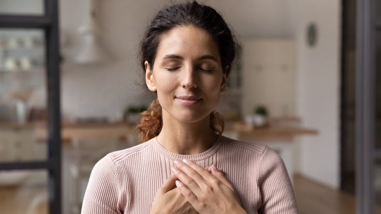 Woman engaging in gratitude practice