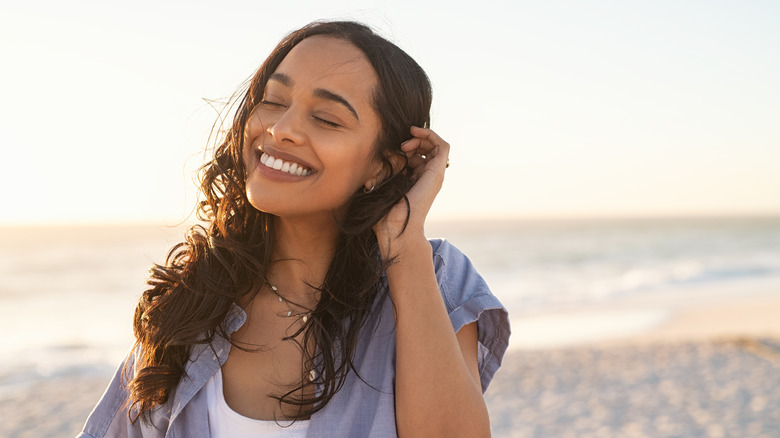 Woman smiling on beach