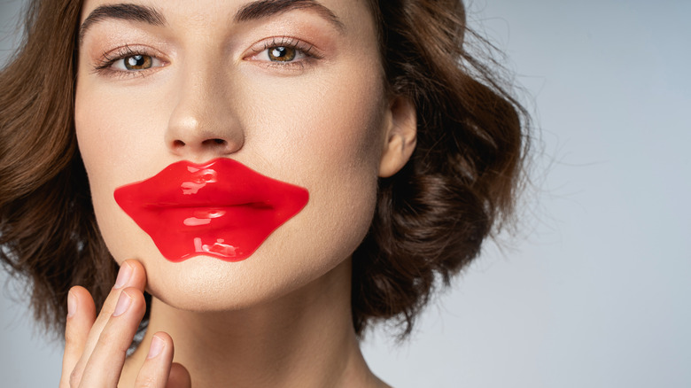 lady wearing red lip mask