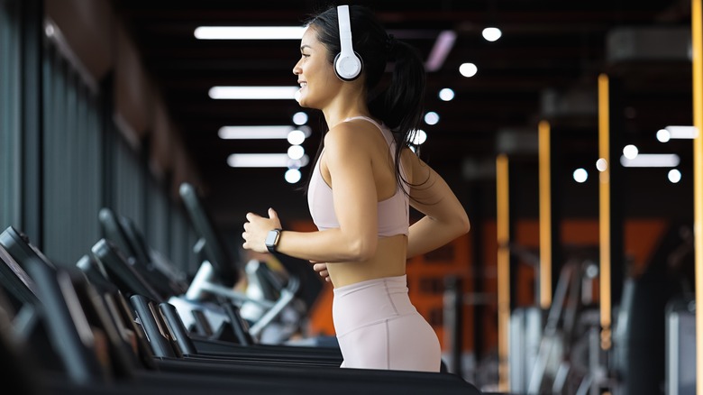 woman on treadmill at gym