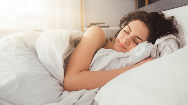 woman sleeping on side