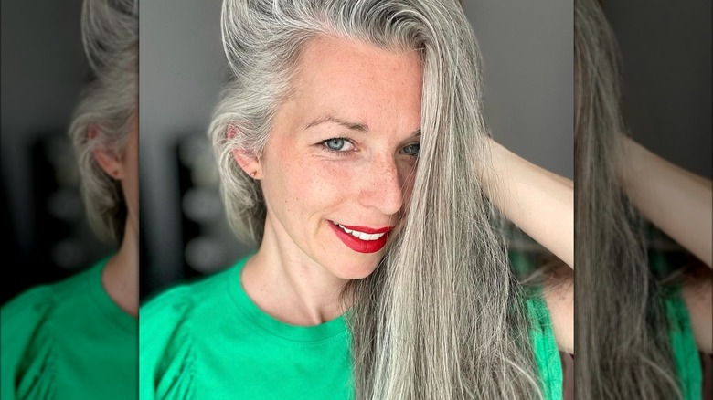 Green shirt compliments silver hair