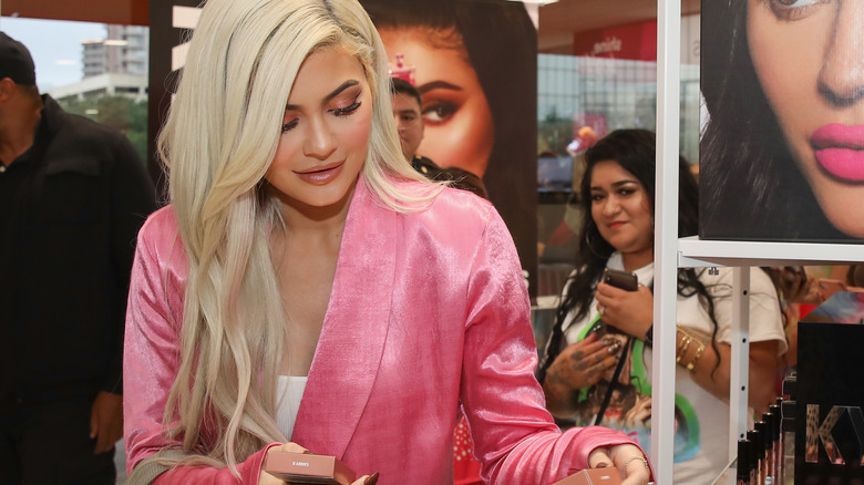 Kylie Jenner with her brand items