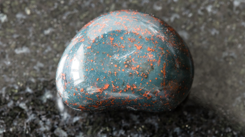 Bloodstone on granite background