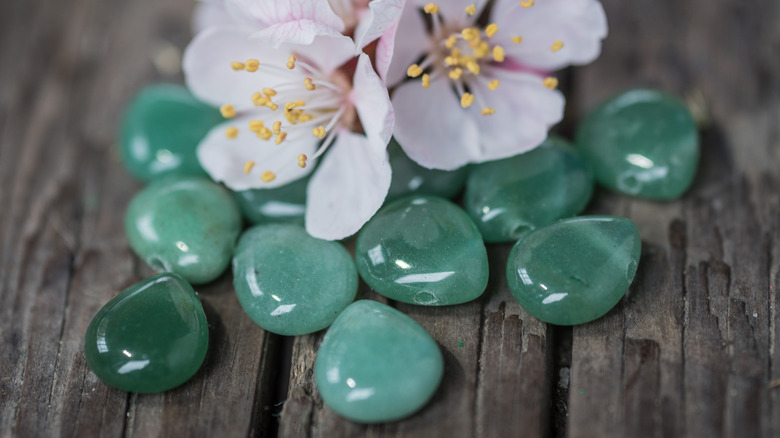 Green aventurine stones on table 