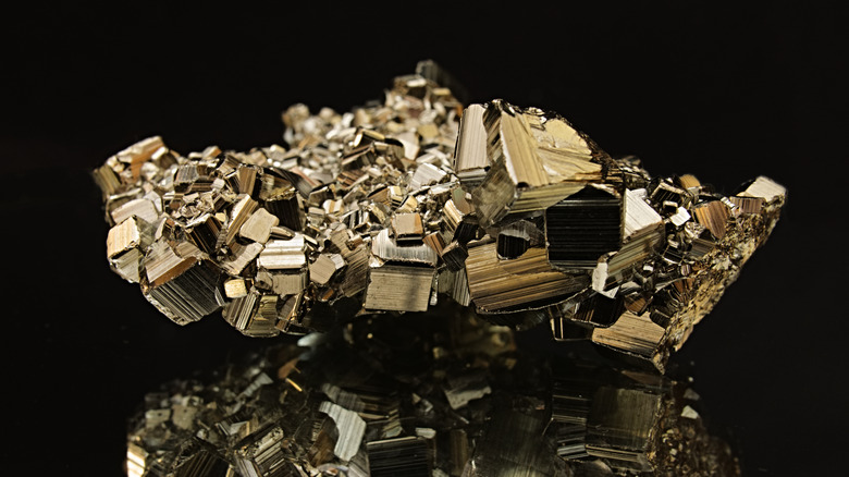 Pyrite on mirrored background