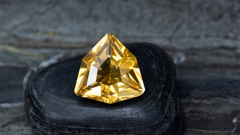 citrine gemstone on black background