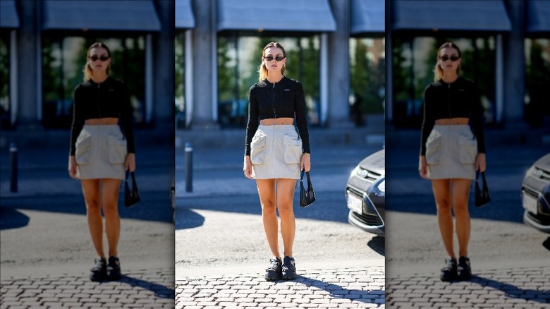 woman wearing cargo skirt