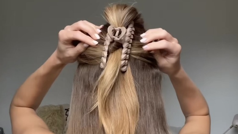 Woman with half up hair and clip