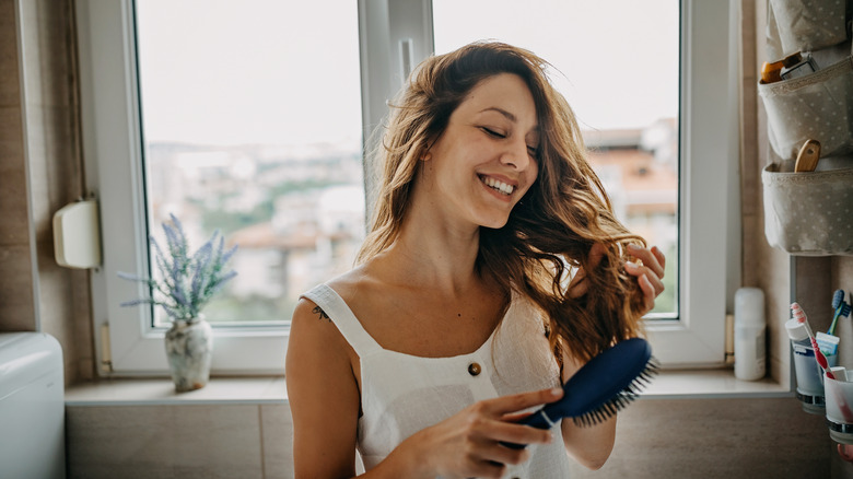 woman taking care of hair