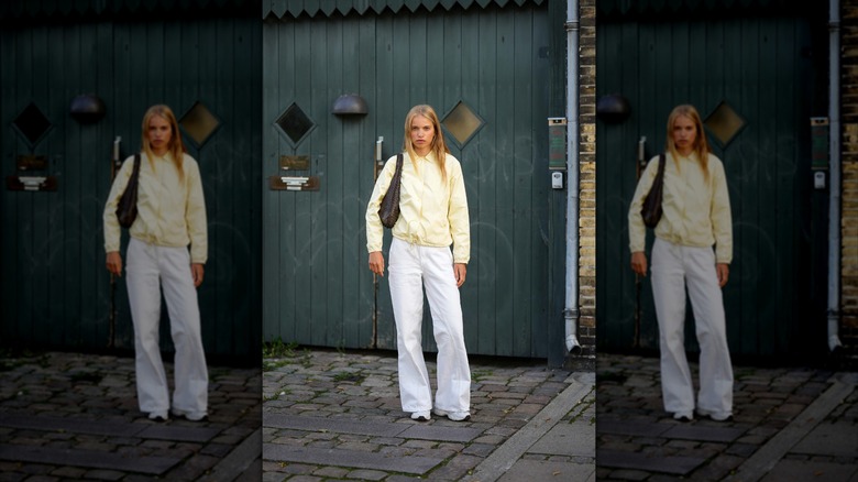 Woman wearing white jeans 