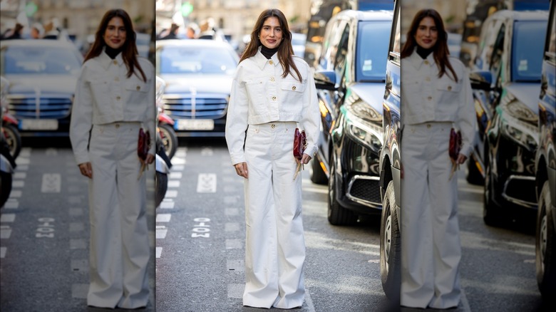 Woman wearing white jeans