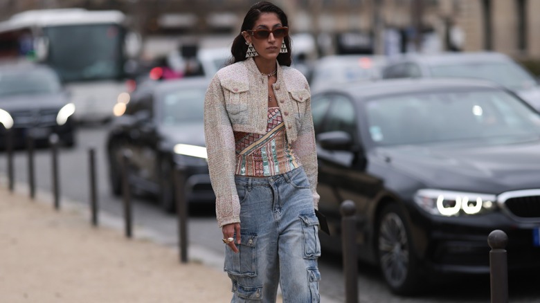 Woman wearing denim cargo pants