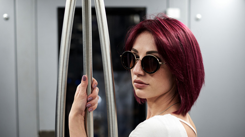 Woman with sunglasses and red hair