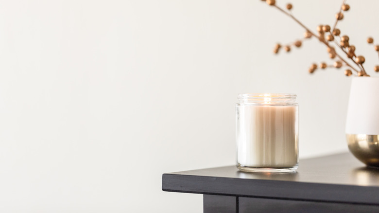 candle on edge of dresser