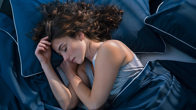 woman sleeping in bed