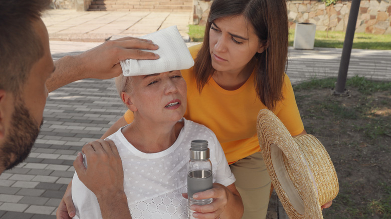 Woman experiencing heat stroke