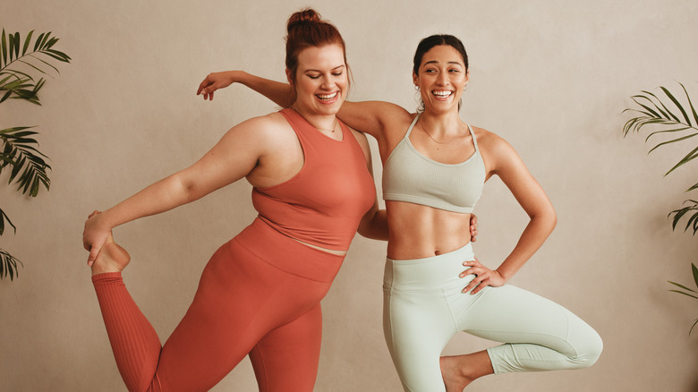 Two women doing yoga together